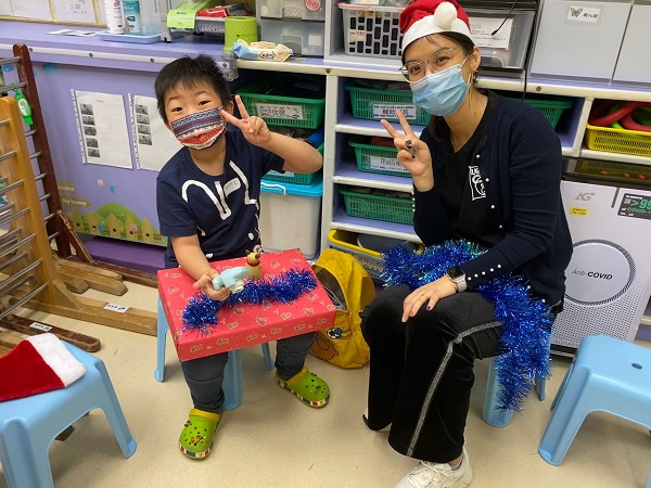 Children were excited when receiving Christmas gifts.