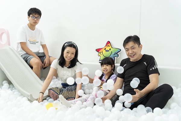 Bonny (second left) two children diagnosed with ASD and her husband (first right) also presumed to be with ASD. Bonny (second left) two children diagnosed with ASD and her husband (first right) also presumed to be with ASD.