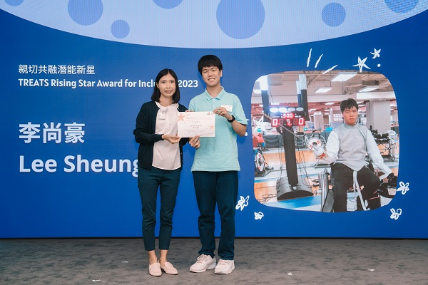 Student Lee Sheung Ho (right) attended the 'TREATS Inclusive Scholarship Scheme 2023' Award Ceremony and received a certificate presented by TREATS Director, Ms Mabel Lo (left). Student Lee Sheung Ho (right) attended the 'TREATS Inclusive Scholarship Scheme 2023' Award Ceremony and received a certificate presented by TREATS Director, Ms Mabel Lo (left).